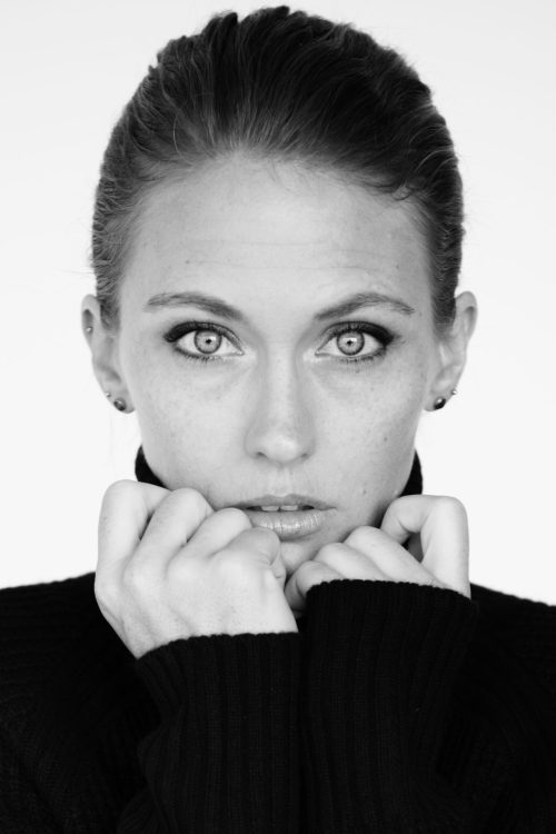 Grayscale of woman headshot serene face expression portrait